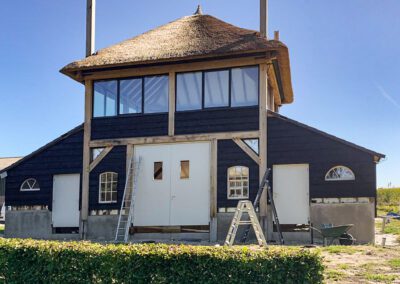 Woonhuis met bijgebouw en kantoorruimte